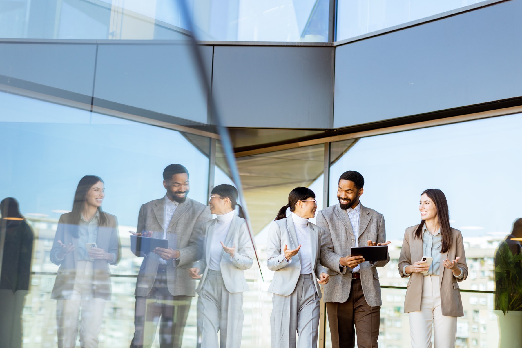 HiyaMee Digital engineers and consultants collaborating in a bright modern office