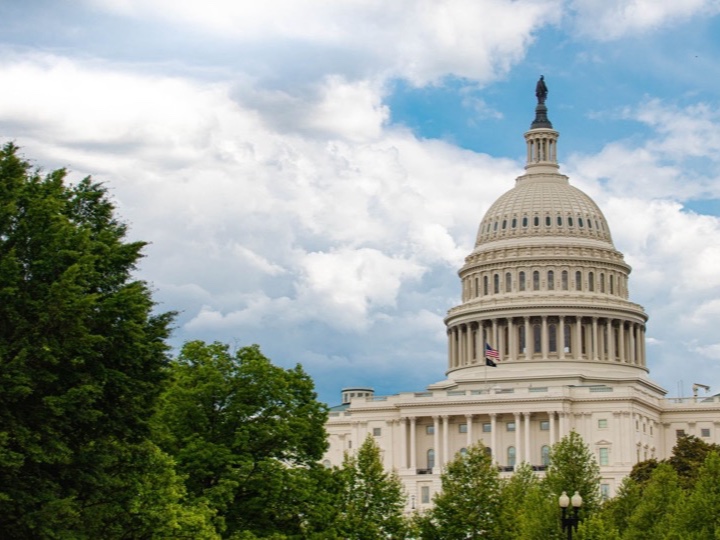 A government capitol building with a classical dome